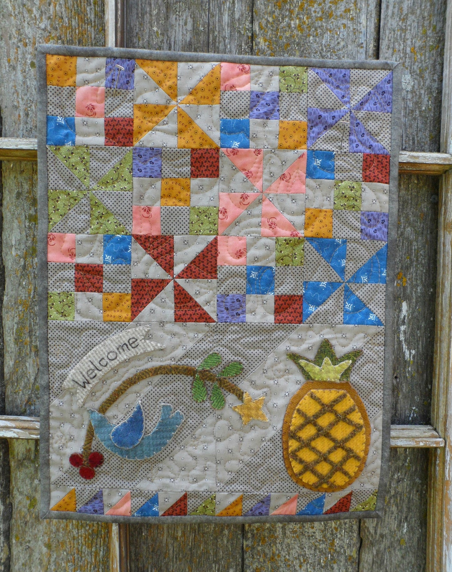 Wool applique on fabric mini wall hanging