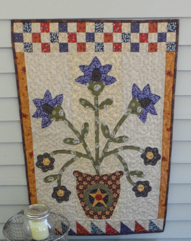 applique wall hanging and table topper quilt patterns