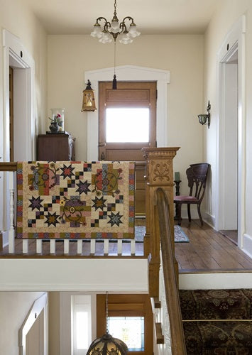 Book of scrap quilt patterns with applique and brief history of applique