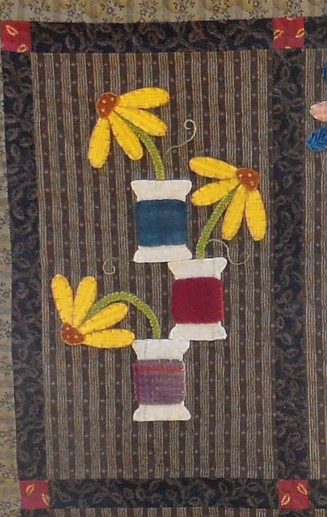 Wool applique on fabric quilt pattern