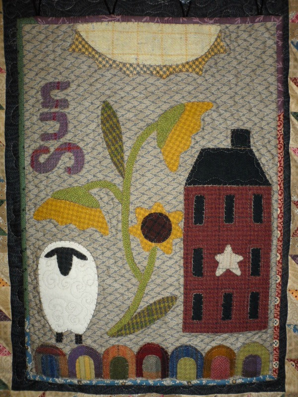 Wool applique on fabric wall hanging quilt pattern