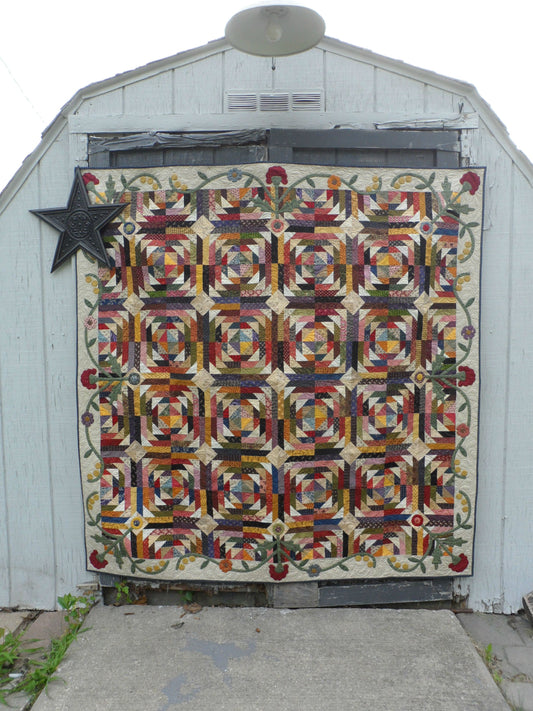 scrappy lap quilt pattern with applique