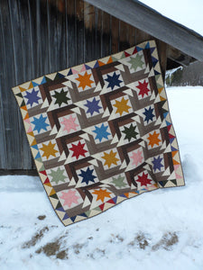 Scrappy lap quilt pattern by Snuggles Quilts