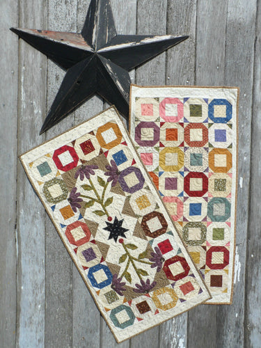 scrappy table runner quilt pattern with applique charm square friendly