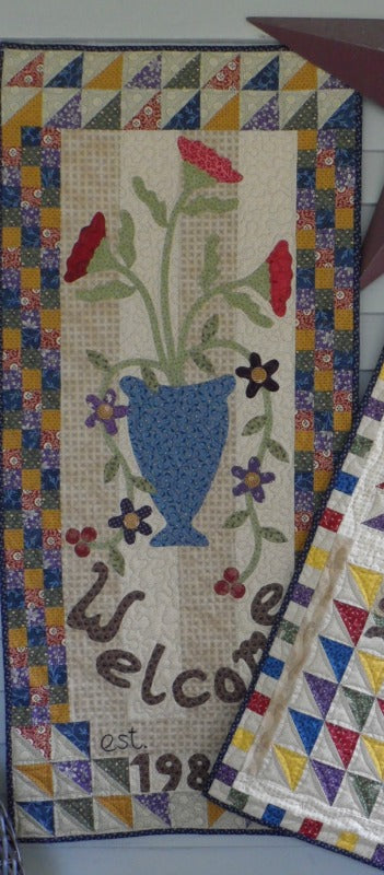 Scrappy applique wall hanging and table topper quilt pattern