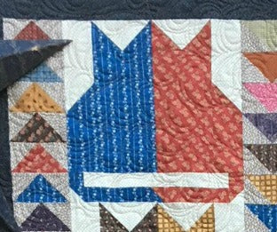 scrappy lap quilt pattern detail of scrappy cat block