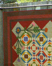 Load image into Gallery viewer, Detail view of scrappy lap quilt designed by Deanne Eisenman for Snuggles Quilts