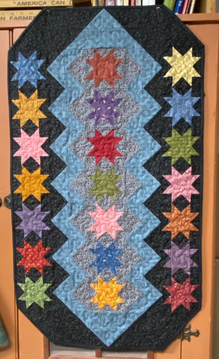 Dream Catcher scrappy table runner quilts pattern by Deanne Eisenman for Snuggles Quilts