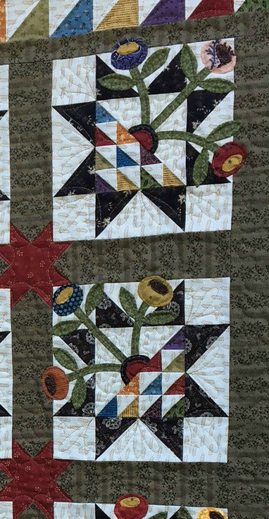 scrappy wall hanging quilt pattern with fabric applique